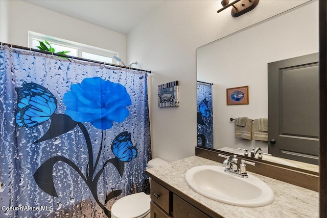 2636 N Wrenley Ln, Post Falls, ID 83854 - bathroom with vanity and a shower with shower curtain