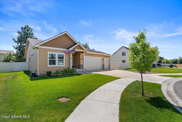2636 N Wrenley Ln, Post Falls, ID 83854 - view of front of home featuring concrete driveway and a garage