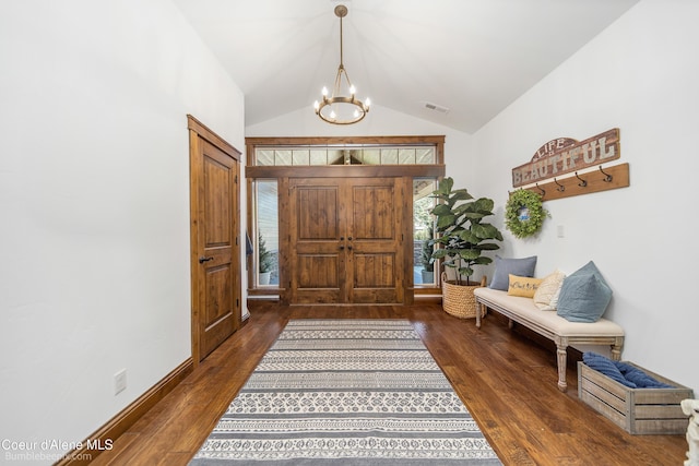 12500 N Partridge Way, Hayden, ID 83835 - foyer entrance with a chandelier, wood finished floors, and lofted ceiling
