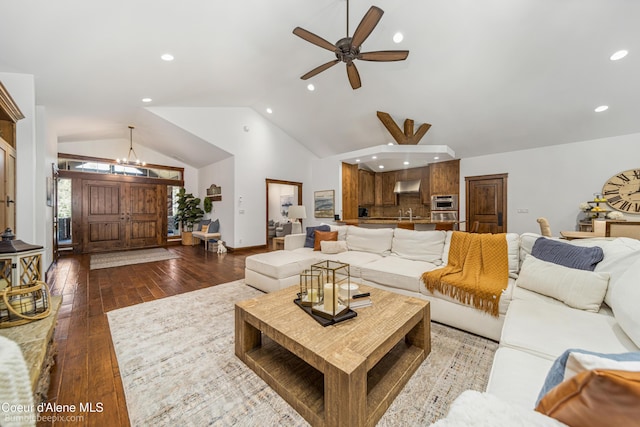 12500 N Partridge Way, Hayden, ID 83835 - living room with recessed lighting, hardwood / wood-style floors, a ceiling fan, high vaulted ceiling, and a chandelier