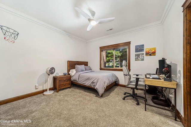 12500 N Partridge Way, Hayden, ID 83835 - carpeted bedroom featuring ornamental molding, a desk, and a ceiling fan