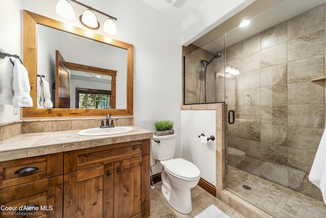 12500 N Partridge Way, Hayden, ID 83835 - full bathroom featuring vanity, a shower stall, and tile patterned floors