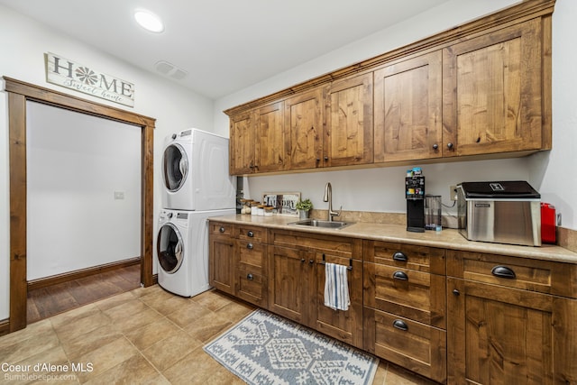 12500 N Partridge Way, Hayden, ID 83835 - washroom with stacked washer and clothes dryer