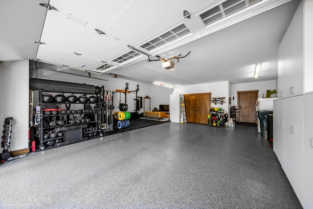 12500 N Partridge Way, Hayden, ID 83835 - garage with a garage door opener