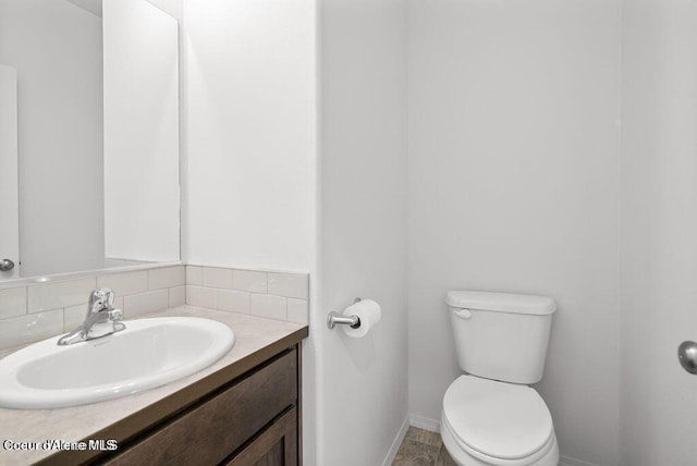 21714 S Lakeview Dr, Worley, ID 83876 - half bath with vanity and backsplash
