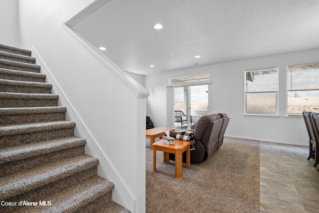 21714 S Lakeview Dr, Worley, ID 83876 - living area featuring stairway, recessed lighting, healthy amount of natural light, and stone finish floors