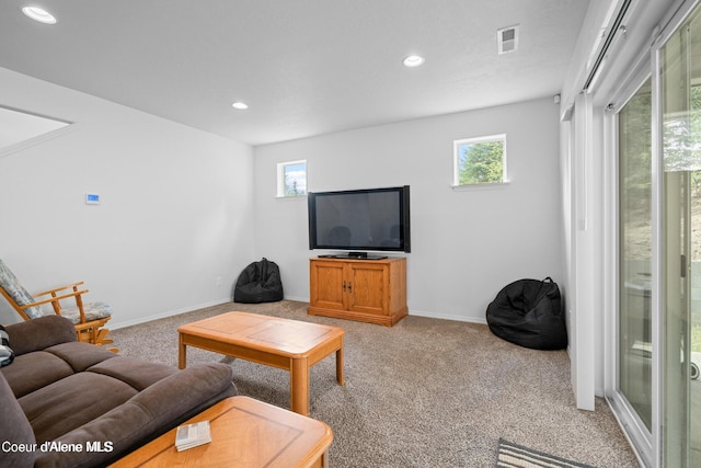 21714 S Lakeview Dr, Worley, ID 83876 - living area featuring plenty of natural light, light carpet, and recessed lighting