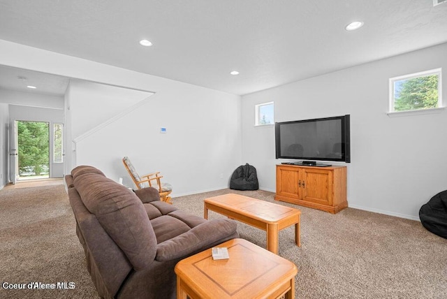 21714 S Lakeview Dr, Worley, ID 83876 - living room featuring light colored carpet, recessed lighting, and healthy amount of natural light
