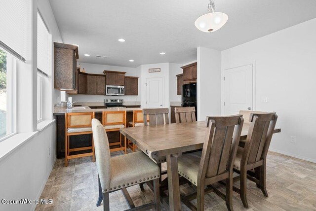 21714 S Lakeview Dr, Worley, ID 83876 - dining space featuring baseboards and recessed lighting