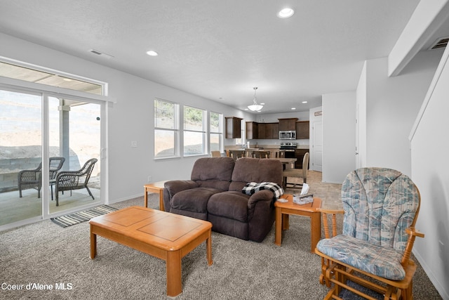21714 S Lakeview Dr, Worley, ID 83876 - living area with recessed lighting and light carpet