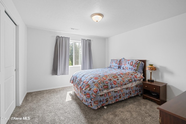 21714 S Lakeview Dr, Worley, ID 83876 - carpeted bedroom featuring baseboards