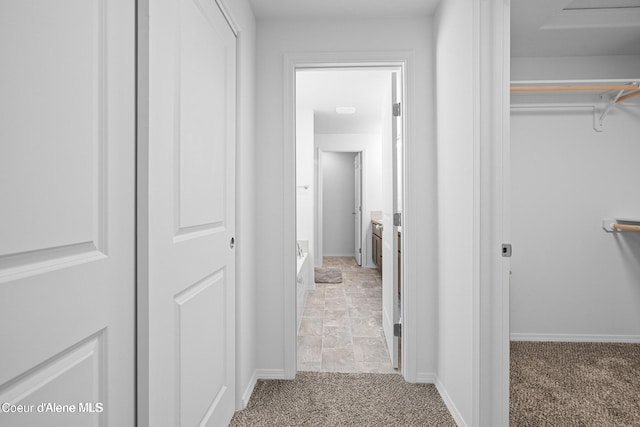 21714 S Lakeview Dr, Worley, ID 83876 - hallway with light carpet and baseboards