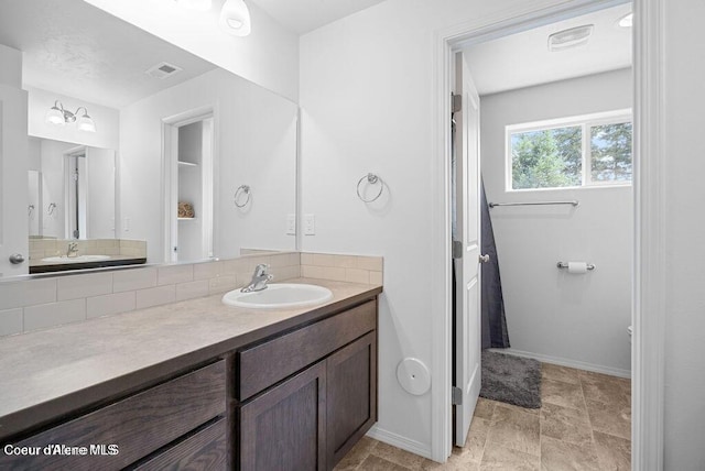 21714 S Lakeview Dr, Worley, ID 83876 - bathroom with vanity and stone finish floors