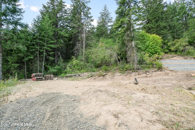 21714 S Lakeview Dr, Worley, ID 83876 - view of yard with a view of trees