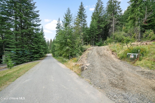 21714 S Lakeview Dr, Worley, ID 83876 - view of road featuring a forest view