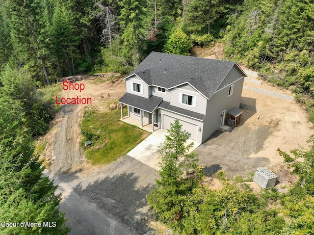 21714 S Lakeview Dr, Worley, ID 83876 - view from above of property featuring a heavily wooded area