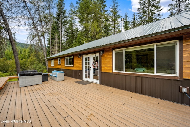 215 Gordon Dr, Priest Lake, ID 83856 - deck featuring an outdoor hangout area and french doors