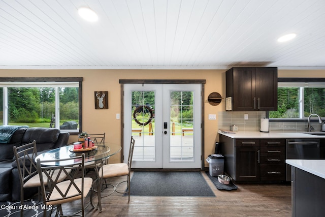 215 Gordon Dr, Priest Lake, ID 83856 - kitchen featuring french doors, light countertops, dark wood-type flooring, healthy amount of natural light, and ornamental molding