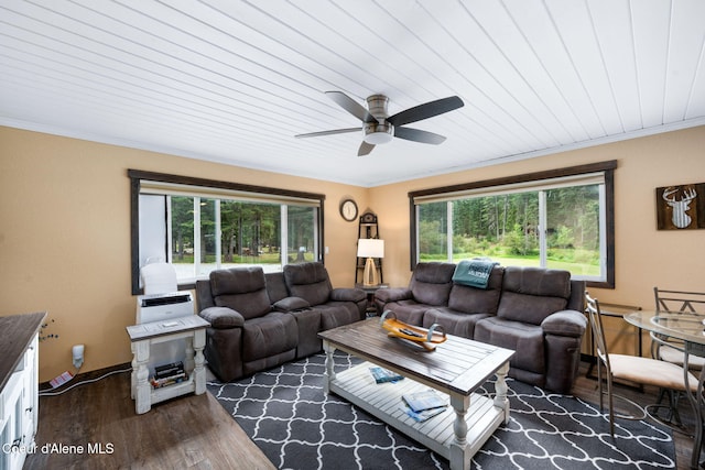 215 Gordon Dr, Priest Lake, ID 83856 - living area featuring plenty of natural light, ceiling fan, wood finished floors, ornamental molding, and wood ceiling