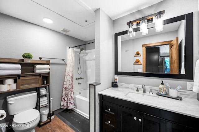 215 Gordon Dr, Priest Lake, ID 83856 - full bathroom featuring vanity, wood finished floors, and shower / bath combo with shower curtain