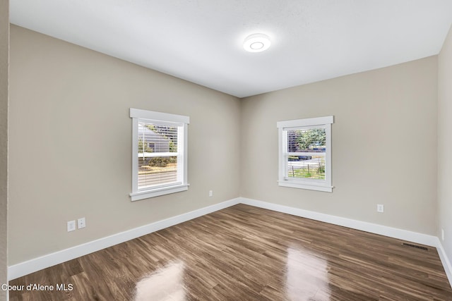 4204 N Jefferson St, Spokane, WA 99205 - unfurnished room with plenty of natural light and dark wood finished floors