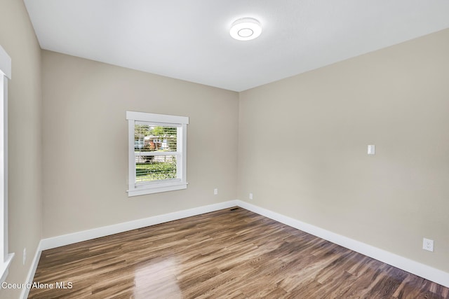 4204 N Jefferson St, Spokane, WA 99205 - spare room with wood finished floors and baseboards