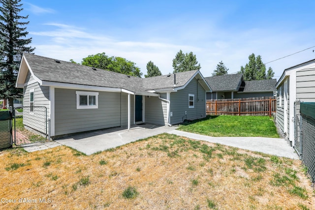 4204 N Jefferson St, Spokane, WA 99205 - back of property featuring a patio area and a shingled roof