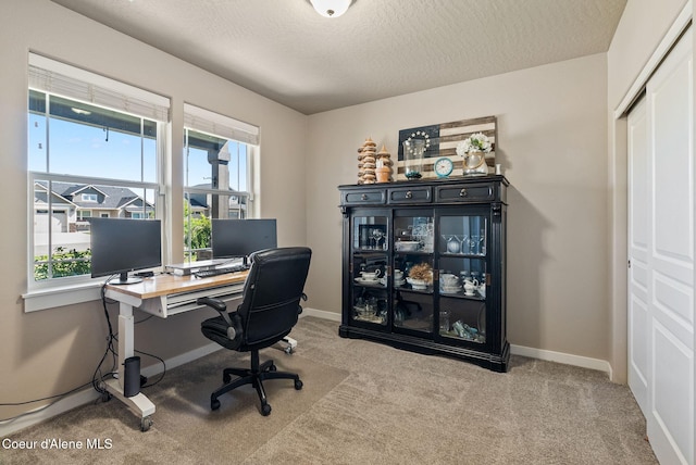 4483 N Connery Loop, Post Falls, ID 83854 - carpeted home office featuring baseboards and a textured ceiling