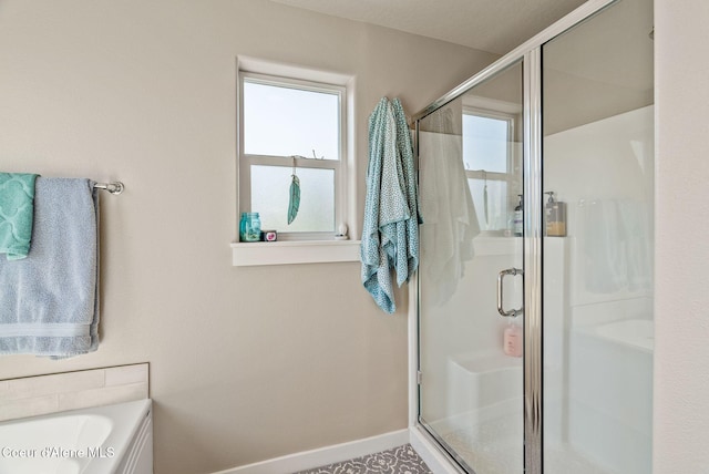 4483 N Connery Loop, Post Falls, ID 83854 - full bath with a stall shower and a bath