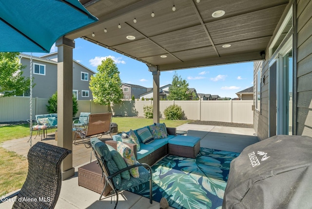 4483 N Connery Loop, Post Falls, ID 83854 - fenced backyard with outdoor lounge area, a patio, and a residential view