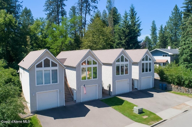 2015 N 13th St, Coeur Dalene, ID 83814 - view of front of house with driveway, stairs, and a garage