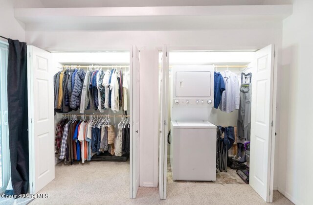 2015 N 13th St, Coeur Dalene, ID 83814 - washroom featuring stacked washer / drying machine and light colored carpet