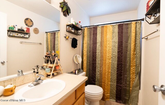 2015 N 13th St, Coeur Dalene, ID 83814 - bathroom with vanity and a shower with curtain