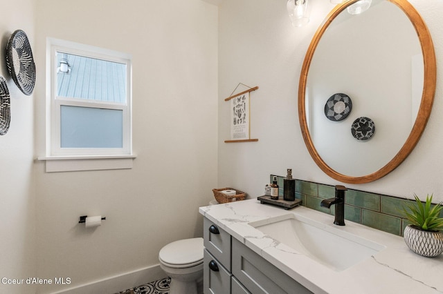 2119 E Lakeside Ave, Coeur Dalene, ID 83814 - bathroom with vanity and tasteful backsplash