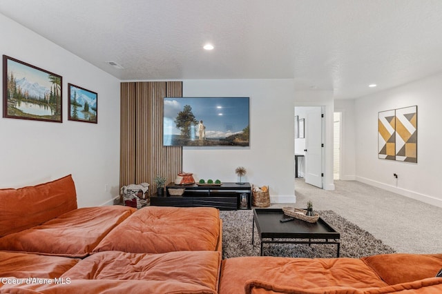 2119 E Lakeside Ave, Coeur Dalene, ID 83814 - carpeted living room with baseboards and recessed lighting