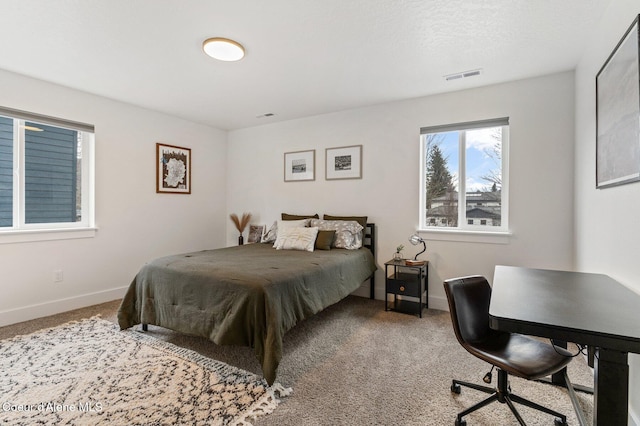2119 E Lakeside Ave, Coeur Dalene, ID 83814 - bedroom with carpet flooring and a desk