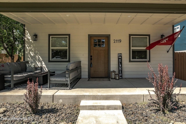 2119 E Lakeside Ave, Coeur Dalene, ID 83814 - property entrance with an outdoor hangout area and a porch