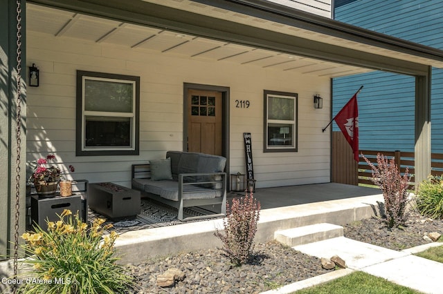 2119 E Lakeside Ave, Coeur Dalene, ID 83814 - doorway to property featuring covered porch