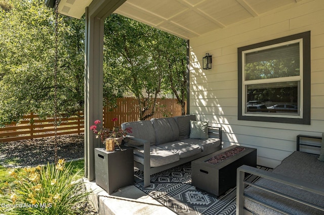2119 E Lakeside Ave, Coeur Dalene, ID 83814 - view of patio / terrace featuring an outdoor living space with a fire pit