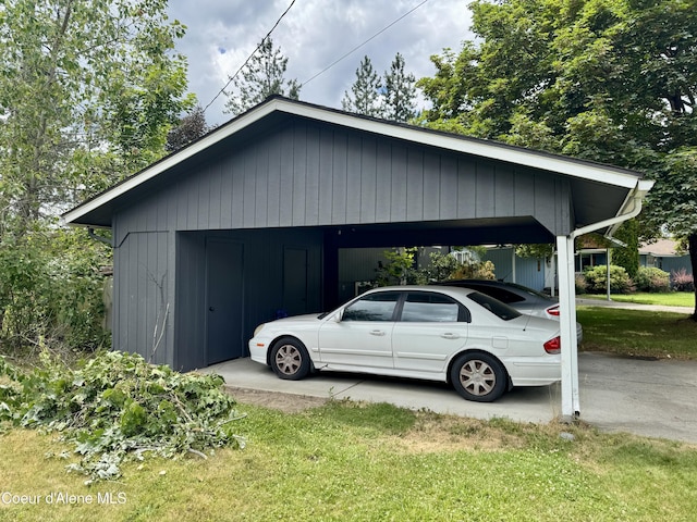 1816-1818 N Burl Ln, Coeur Dalene, ID 83814 - view of side of property with a lawn and a detached carport