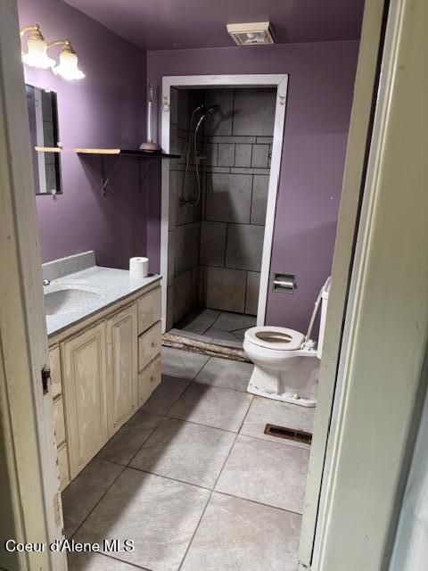 346S S 4th St, Saint Maries, ID 83861 - full bathroom featuring tile patterned flooring, vanity, and a shower stall
