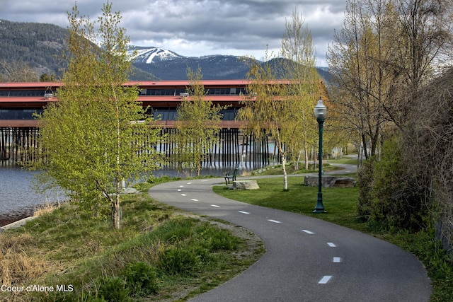 349 Jasper Loop, Ponderay, ID 83852 - view of community featuring a yard and a water and mountain view