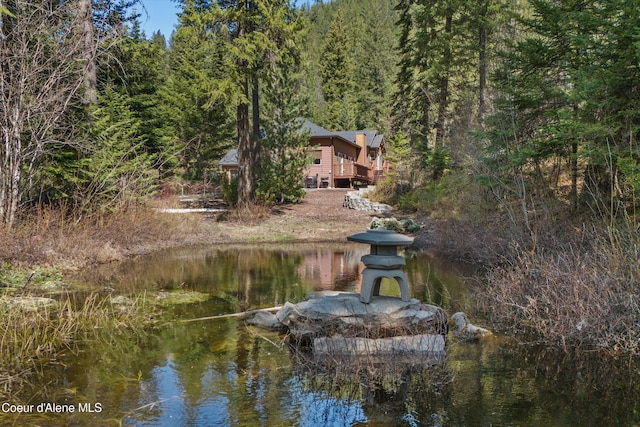 23388 N Teddy Loop, Rathdrum, ID 83858 - water view featuring a heavily wooded area