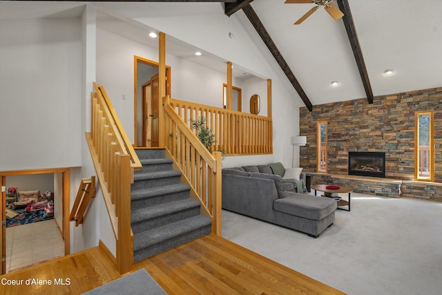 23388 N Teddy Loop, Rathdrum, ID 83858 - living area featuring a ceiling fan, recessed lighting, stairway, a fireplace, and carpet flooring