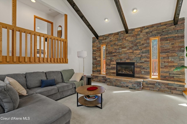 23388 N Teddy Loop, Rathdrum, ID 83858 - living room with beam ceiling, carpet flooring, recessed lighting, and a fireplace