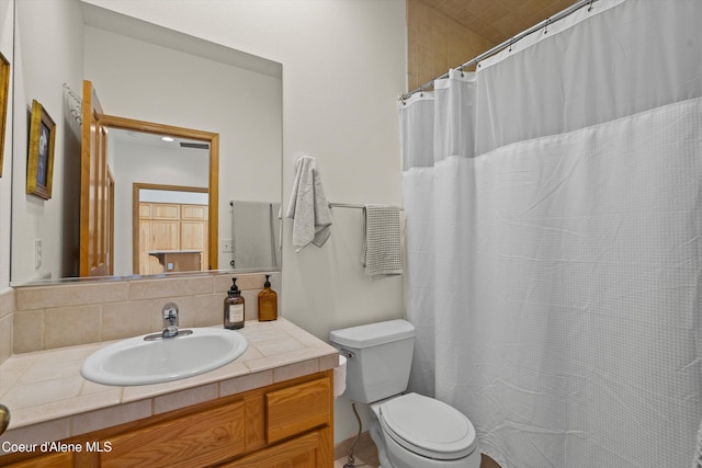 23388 N Teddy Loop, Rathdrum, ID 83858 - full bathroom with vanity, tasteful backsplash, and a shower with shower curtain