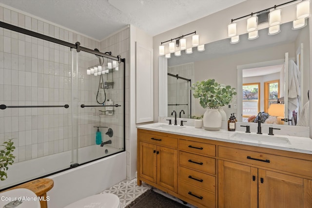 23388 N Teddy Loop, Rathdrum, ID 83858 - full bath featuring combined bath / shower with glass door, double vanity, and a textured ceiling