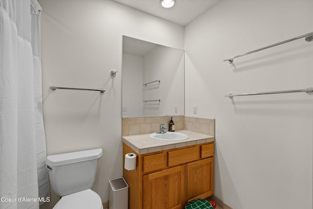 23388 N Teddy Loop, Rathdrum, ID 83858 - full bathroom featuring vanity, tasteful backsplash, and a shower with shower curtain