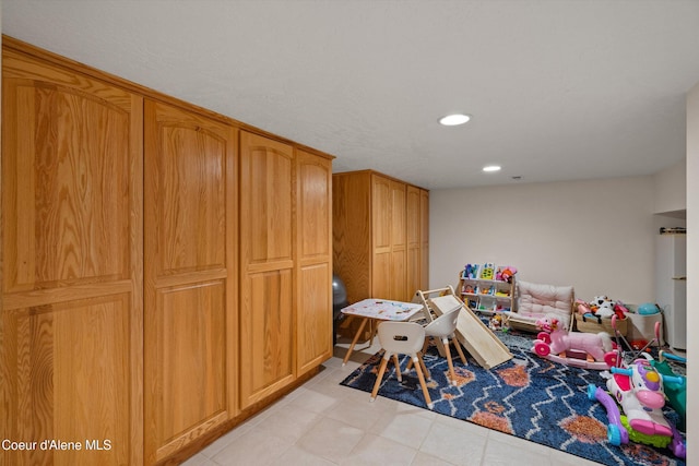 23388 N Teddy Loop, Rathdrum, ID 83858 - recreation room with recessed lighting and light tile patterned flooring