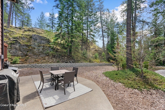 23388 N Teddy Loop, Rathdrum, ID 83858 - view of patio with outdoor dining space